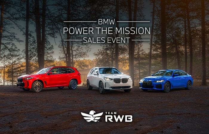 A dramatic lineup of patriotic-colored BMWs featuring the BMW i5 M60, BMW X3 xDrive30i, and X5 xDrive40i with the Team RWB logo at the bottom