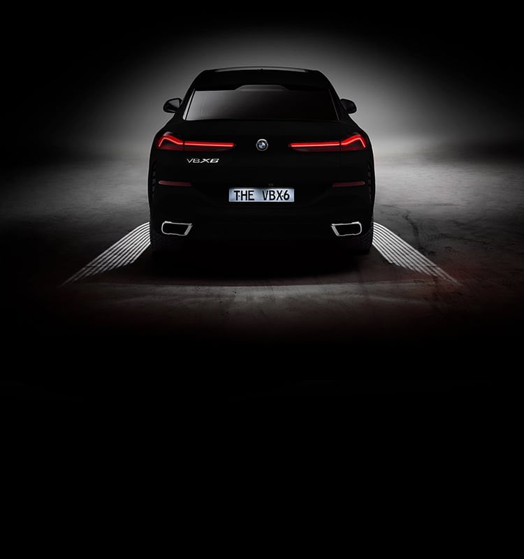 Rear shot of BMW VBX6 Concept Vehicle with Welcome Light carpet