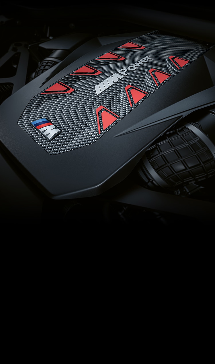 Close-up detail of the 4.4-liter BMW M TwinPower Turbo V-8 engine with integrated high-performance electric motor