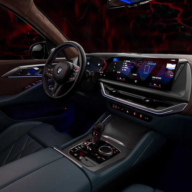 Detail of iDrive 8 on BMW Curved Display set against a background image with an abstract lava pattern