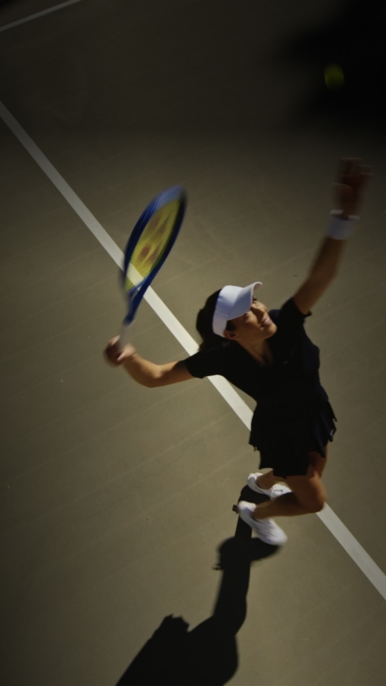 Ana Ivanović preparing to serve during a tennis match