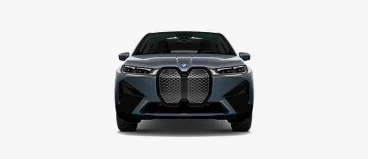A frontal shot of the BMW iX in front fo a white background