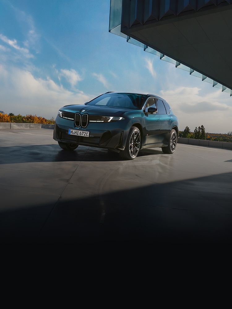 The BMW iX3 M60 xDrive parked on a roof