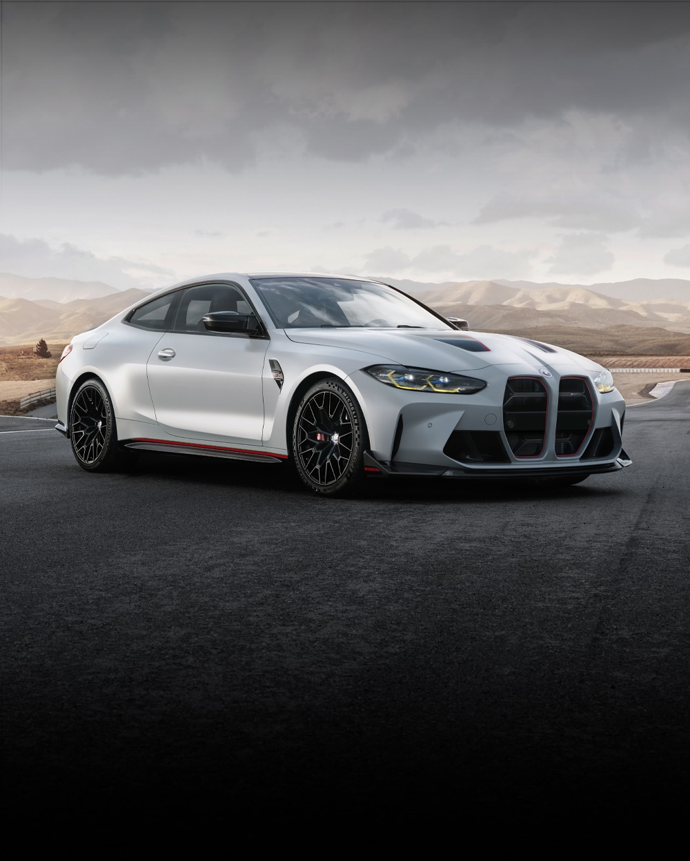 The Limited Edition BMW M4 CSL is parked with a desert landscape in the background