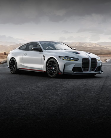 The Limited Edition BMW M4 CSL is parked with a desert landscape in the background