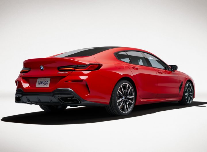 A rear view of the M850i Edition M Heritage with a prominent shadow