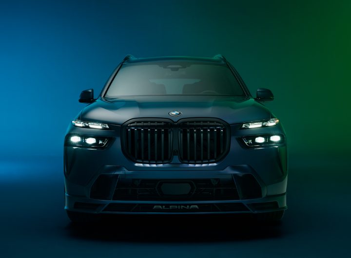 A front shot of the XB7 MANUFAKTUR in front of a blue and green gradient backdrop