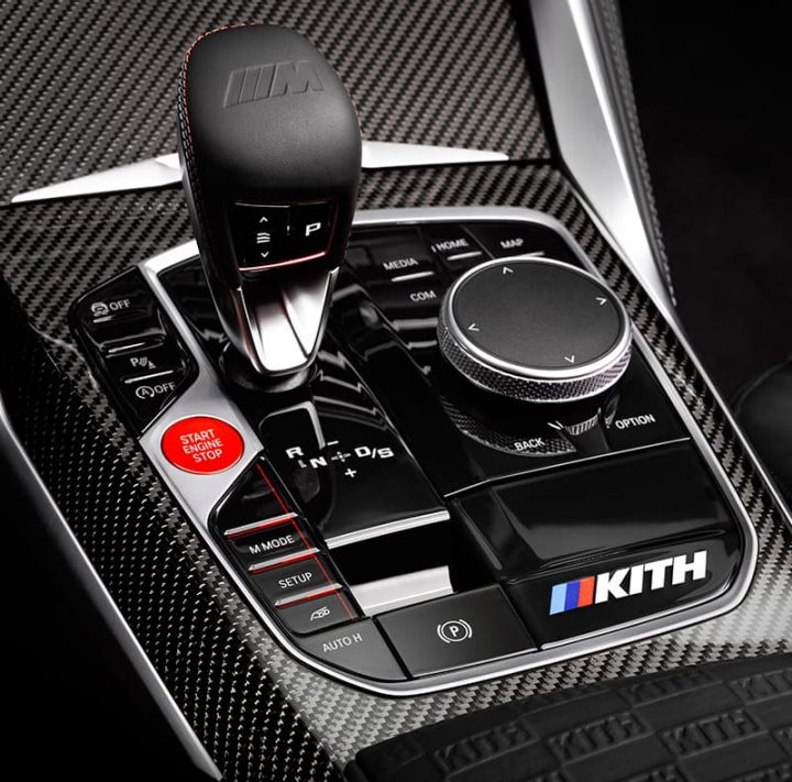 Detail of gear shifter, drive mode buttons, and iDrive touchpad with Kith branding