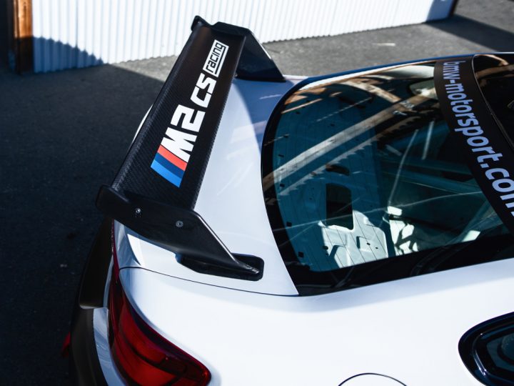 Closeup of the adjustable rear wing on a BMW M2 CS Racing