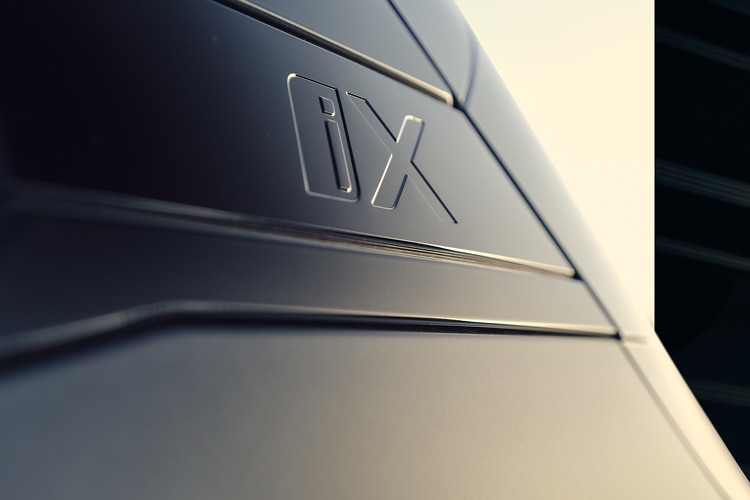 A close up of the iX logo on the BMW iX