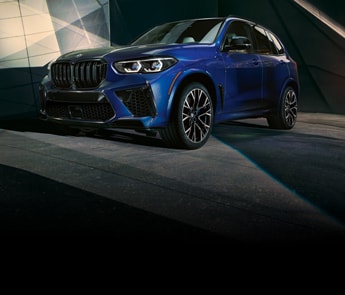 A low, front angle view of the X5 M's dynamic exterior
