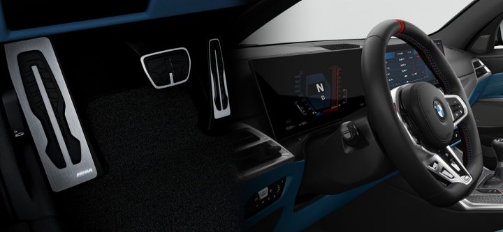 Detail shot of the BMW M Pedals and the standard three-spoke M Sport Steering wheel