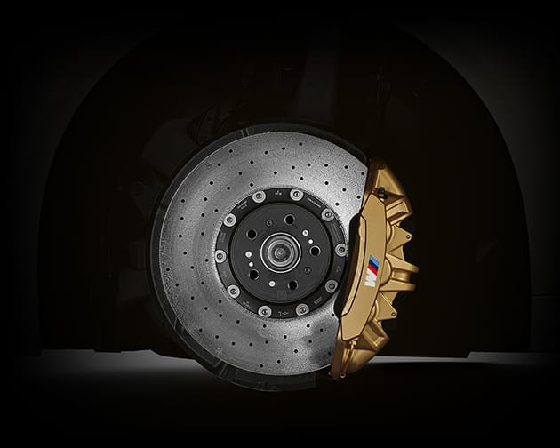 Detail shot of the available M Carbon Ceramic Brakes with eye catching calipers finished in gold