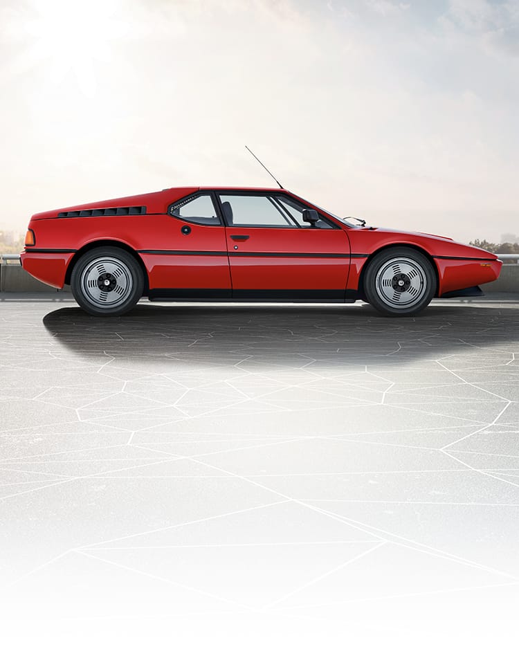 A classic BMW M1 vehicle in red