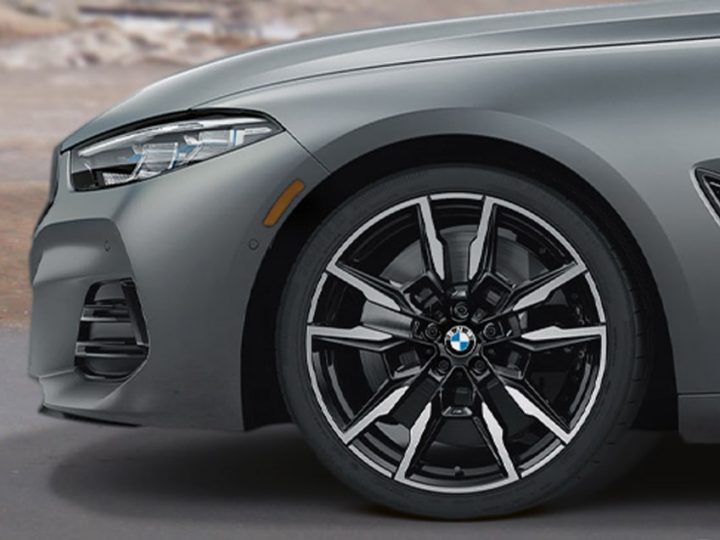 Detail of 20 inch M wheels and M Sport brakes on the 2026 BMW M850i xDrive Convertible