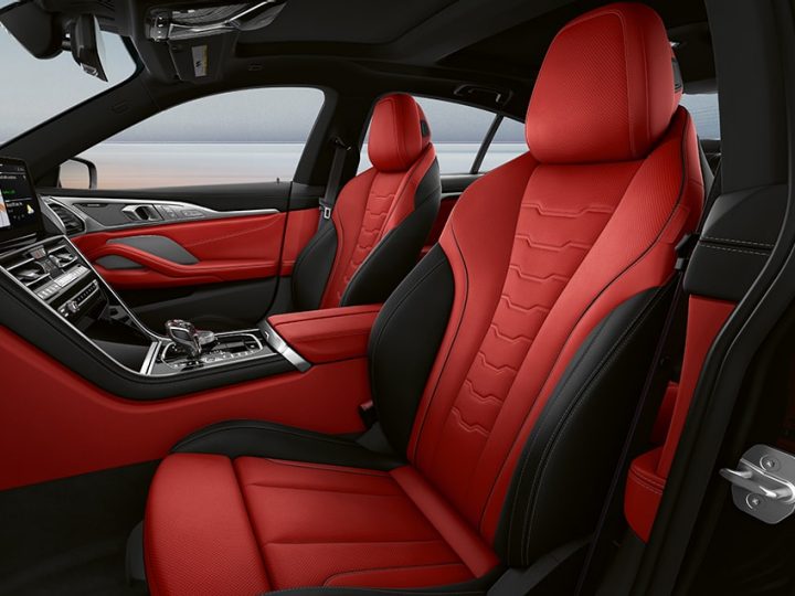Luxurious Motegi Red Leather upholstery and heated seats in a 2026 BMW 8 Series Gran Coupe
