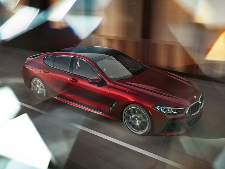 An overhead view of a BMW 840i Gran Coupe in Aventurin Red Metallic