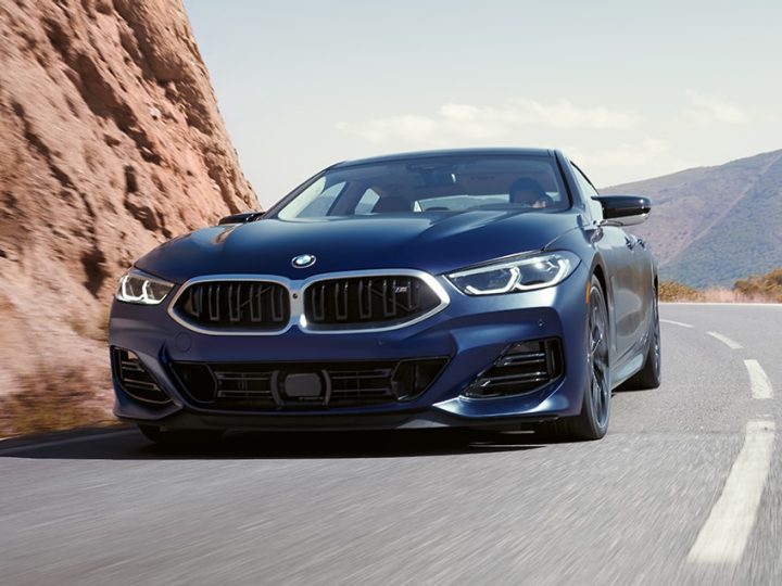 A 2026 BMW M850i xDrive Gran Coupe demonstrates its control and responsiveness on a mountain road