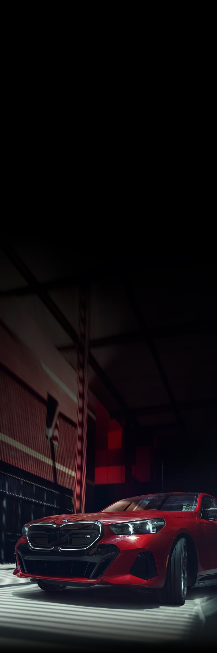 Low front view of the all-electric i5 M60 featuring the Illuminated Kidney Grille