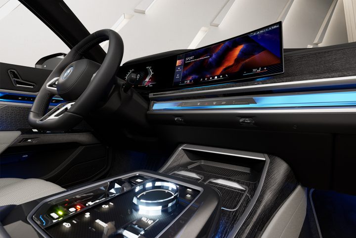 Detail of steering wheel and Curved Display inside the BMW i7