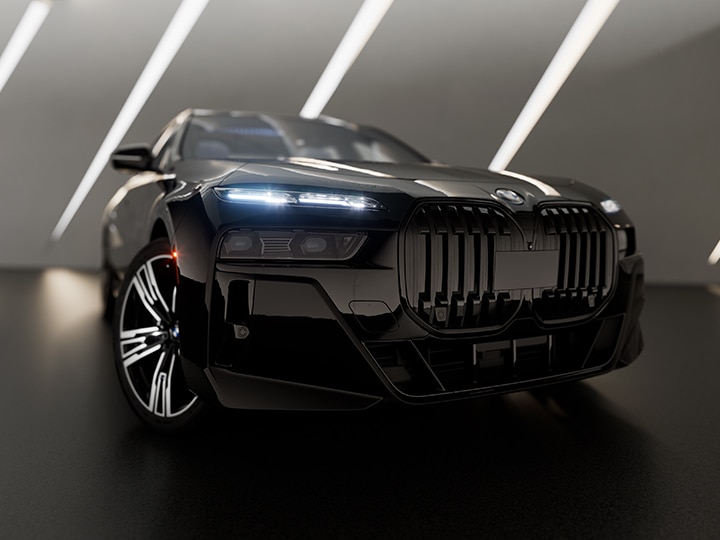 Front view of BMW i7 in a dramatic studio space