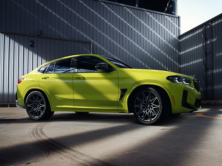 Angled view of 2025 BMW X4 M in Sao Paolo Yellow