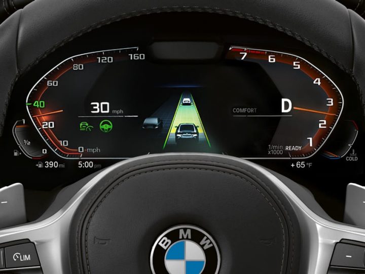 Detail of Digital Instrument Cluster in the 2026 BMW 840i Coupe, showcasing the technology of available Driving Assistance Professional Package