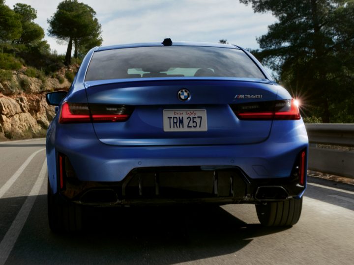 Back view of the BMW M340i Sedan, showcasing the dual exhaust system and tailpipes
